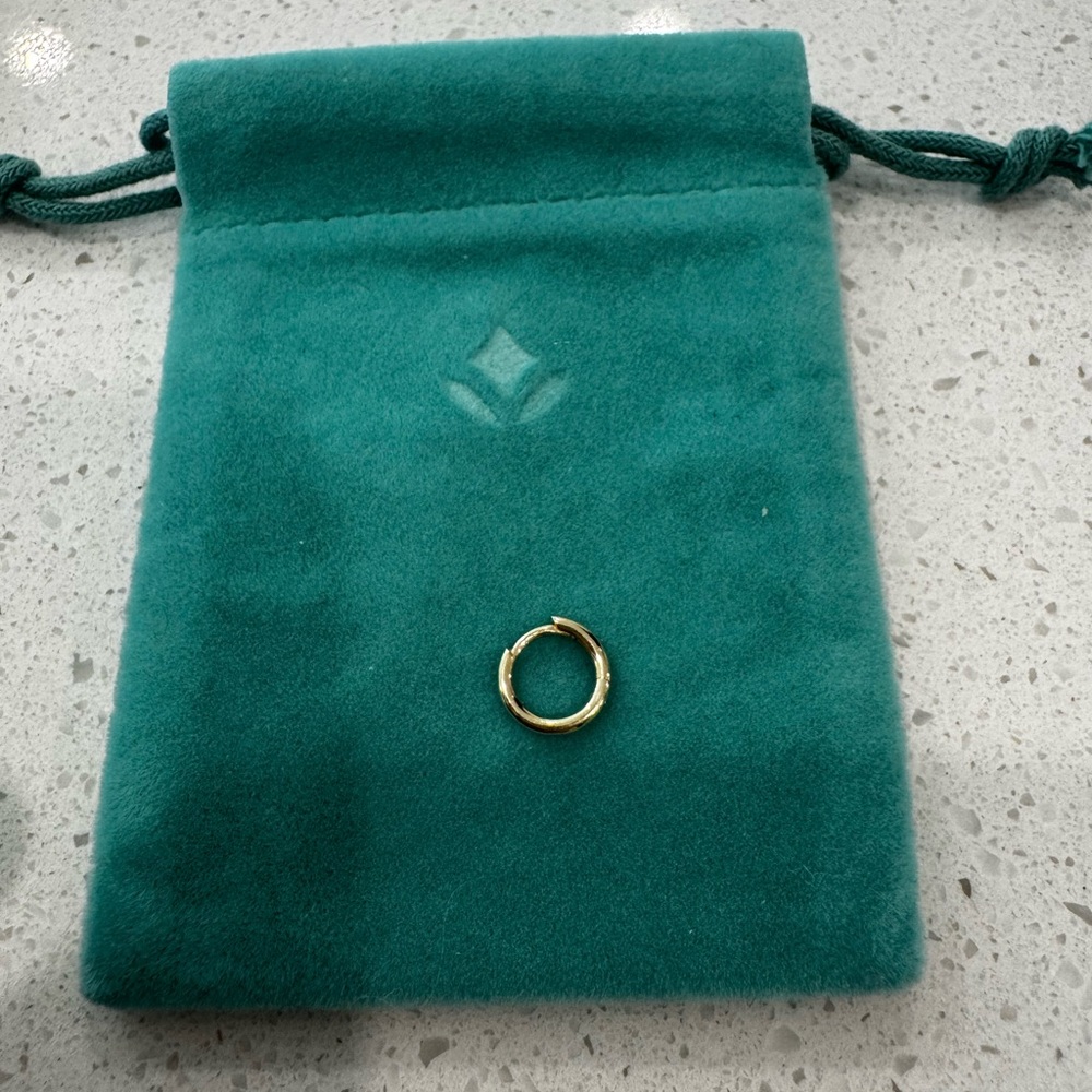 Sold 14k gold cartilage hoop